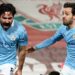 Man City tightens title grip at Anfield