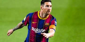 Messi makes Barcelona history in Huesca win
