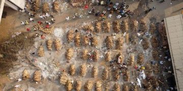 Covid-19: Gravediggers Work Round The Clock As India Infections Top 18 Million
