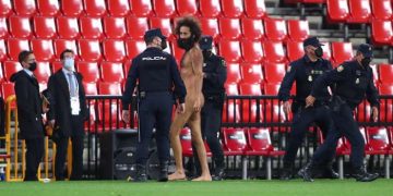 Police says pitch invader hid for hours before Granada-Man Utd match