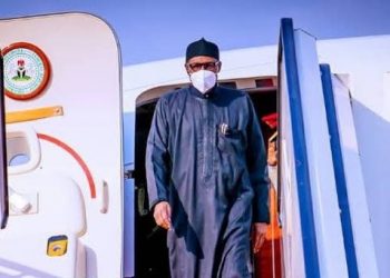 Buhari Returns to Abuja After African Finance Summit in France