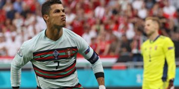 Ronaldo sets Euro record as Portugal begin title defence with Hungary win