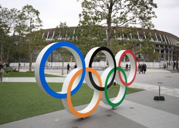 Tokyo Olympics official dies after jumping in front of train