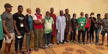 National Embarrassment: Nigeria’s Contingent Arrive Tokyo In Arsenal Jerseys