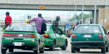 Agbero Menace: Abuja Commuters Now Scared Of Parking/Dropping Off Loved Ones At Bus Stops