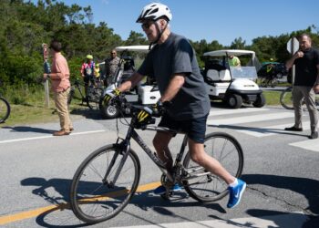 Biden Falls From Bike But Is Unhurt