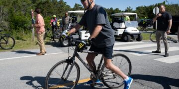 Biden Falls From Bike But Is Unhurt