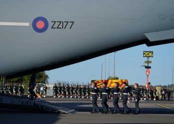 Plane Conveying Queen Elizabeth’s Coffin Touches Down London