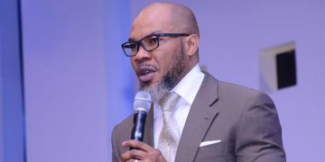 Nigerian Pastor Who Mounted Pulpit With AK-47 Rifle Apologises, Withdraws From Pastoral Duties