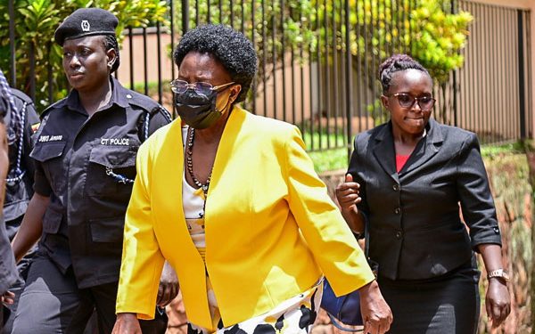 In Yellow, Ugandan Government Minister, Mary Kitutu