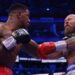 Joshua Punches Down Helenius, Triumphs Via Knockout