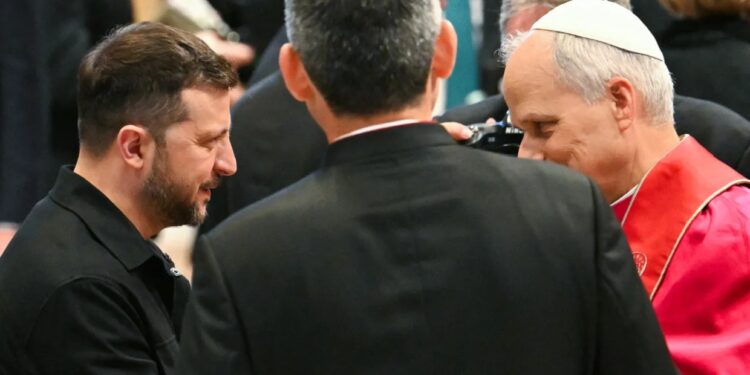 President Volodymyr Zelensky (L) after a Holy mass for the beginning of Pope Leo XIV's pontificate, in St Peter's basilica in The Vatican on May 18, 2025