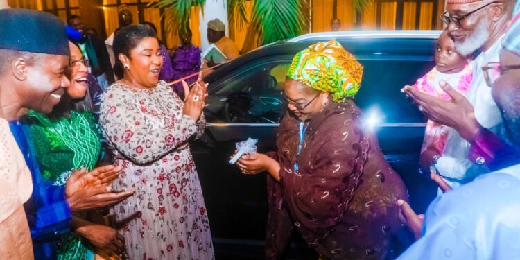 Engr. Dr. Bahijjahtu Abubakar being presented with the key to a SUV(JAC) 4,2024 model, by the Head of the Civil Service of the Federation, Mrs Didi Esther Walson-Jack, OON, mni, at the 2025 Federal Civil Service Rewards and Recognition Awards Ceremony, in Abuja.