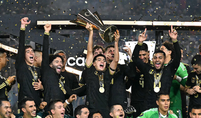 Mexico's players celebrate with the trophy their victory at the end of the Concacaf Gold Cup final football match between Mexico and USA at NRG Stadium in Houston, Texas on July 6, 2025. (Photo by Chandan Khanna / AFP)