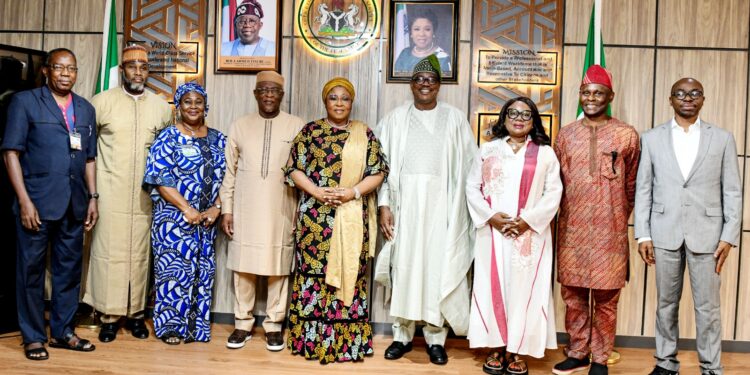 HCSF, Mrs. Didi Esther Walson-Jack, OON, mni, inaugurating the  Editorial Committee on Civil Service History Book, recently in Abuja.