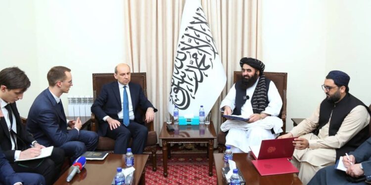 This handout photograph taken on July 3, 2025 and released by Afghanistan's Ministry of Foreign Affairs shows Afghanistans Foreign Minister Amir Khan Muttaqi (2R) meeting with Russias ambassador to Afghanistan Dmitry Zhirnov (3L) at the foreign ministry in Kabul. Afghanistan's government said on July 3, 2025 that Russia had become the first country to officially recognise its rule, calling it a "brave decision". The announcement came after a meeting between Afghanistan's Foreign Minister Amir Khan Muttaqi and Russia's ambassador to Afghanistan, Dmitry Zhirnov, in Kabul. (Photo by Afghanistan's Ministry of Foreign Affairs / AFP)