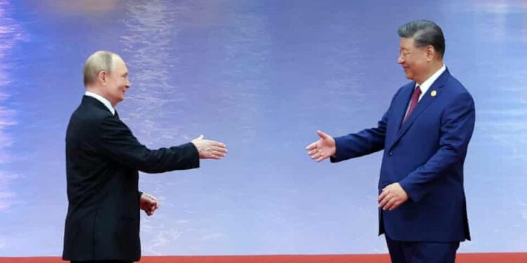 Chinese President Xi Jinping welcomes Russian President Vladimir Putin at the Shanghai Cooperation Organisation (SCO) summit in Tianjin, China