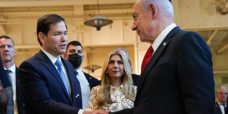 US Secretary of State Marco Rubio and Israeli Prime Minister Benjamin Netanyahu shake hands, as they visit the Western Wall Tunnels, in Jerusalem's Old City, September 14, 2025