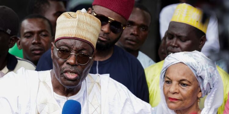 Presidential candidate Issa Tchiroma Bakary of the Cameroon National Salvation Front (FSNC) speaks to the media after casting his vote on the day of Cameroon’s presidential election at the polling station of Ecole Maternelle de Foulbere in Garoua, Cameroon, October 12, 2025