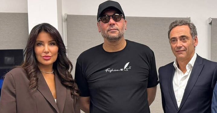 A handout photo released by the defence team of Hannibal Kadhafi, son of Libya's deposed ruler Muammar Gaddafi, on November 10, 2025, shows the Chief of Staff of Gadaffi's Defence Team and Media and Communications Officer Ines Harrak (L), Hannibal al-Kadhafi (C) and French Lawyer Laurent Bayon (R) as they pose at the Lebanese Internal Security forces (ISF) headquarters in Beirut.