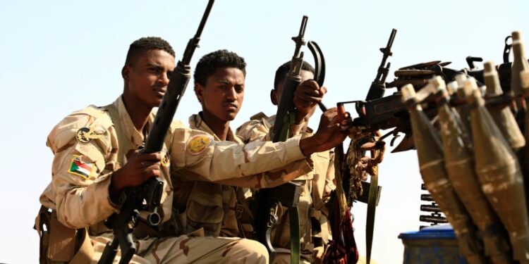 Sudanese soldiers from the Rapid Support Forces unit patrol during a rally for the leader, Mohamed Hamdan Dagalo, in Garawee town, north of Sudan, Saturday, June
15, 2019.