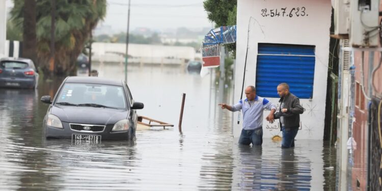 A photo shows a flooded road after torrential rain hits Tunis, Tunisia