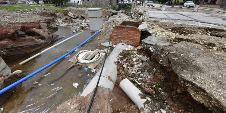 Damage caused to road infrastructure by heavy rains and flooding in Kariega, South Africa