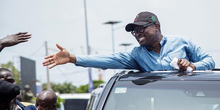 Romuald Wadagni greets supporters at a campaign rally in Cotonou, Benin, Friday, April 10, 2026.