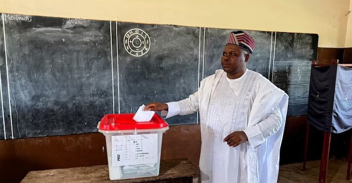 Presidential candidate Paul Hounkpe of FCBE votes during the presidential election, at a polling station in Bopa, Benin April 12, 2026