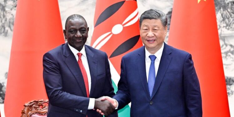 Chinese President Xi Jinping (R) shakes hands with Kenyan President William Ruto at the Great Hall of the People in Beijing, China, April 24, 2025