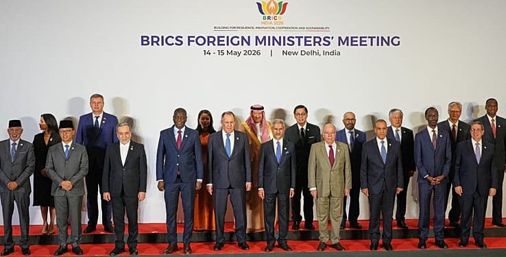 Government representatives from BRICS countries and partner countries pose for a photo at the BRICS foreign ministers' meeting in New Delhi, India, 14 May 2026